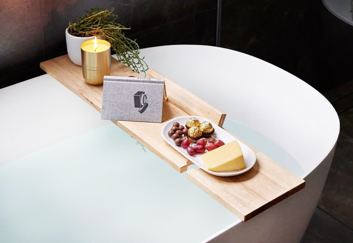 Hardwood Bath Caddy shown with a plate of fruit on top.