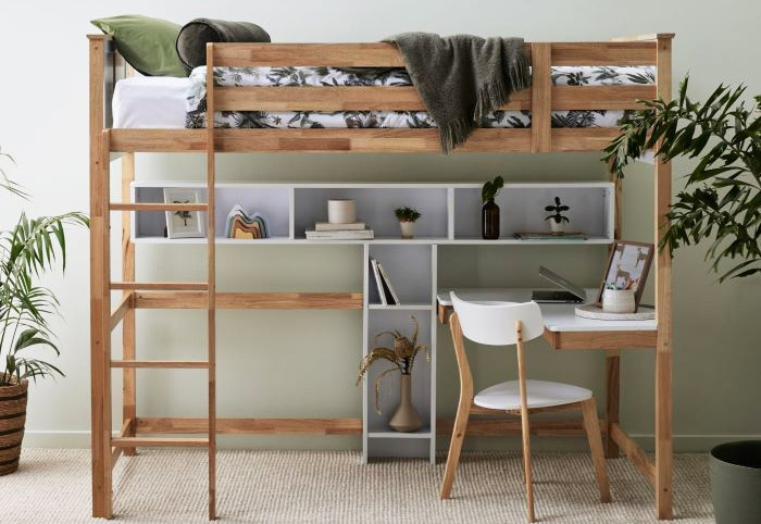 Buddy loft bed with desk underneath and built-in shelving.