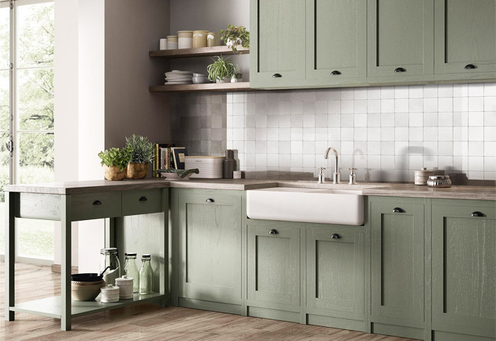 Beaumont Tiles Farmhouse Kitchen with green cabinetry.