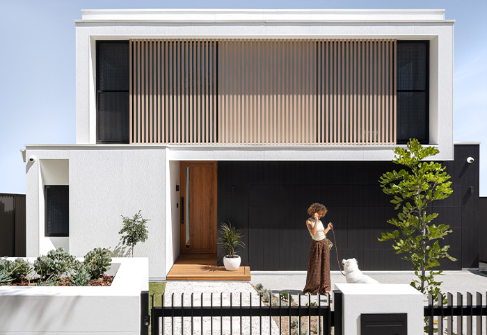 Bennett House featuring concrete cladding in white.