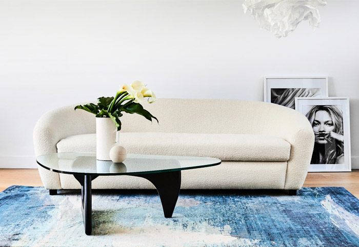 Isamu Noguchi replica table in a living room.