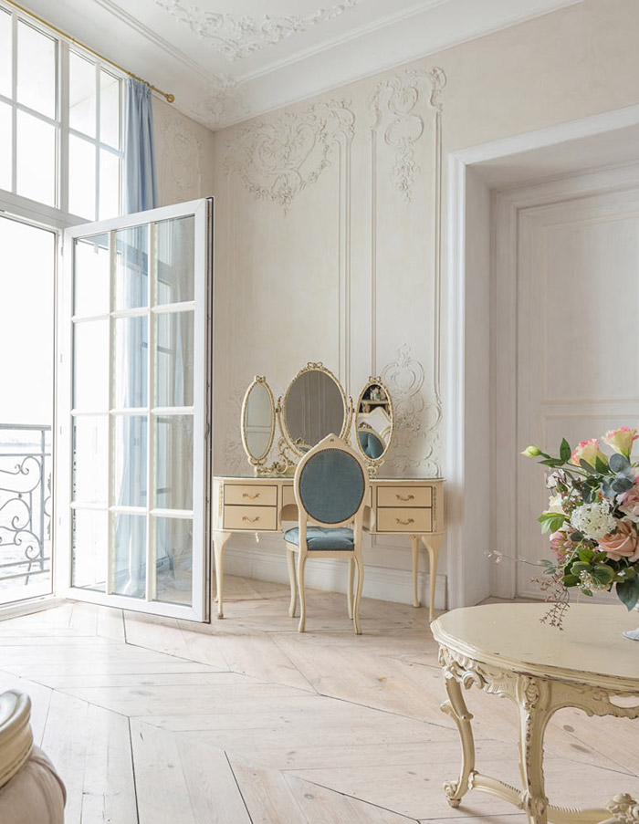 French Provincial wall panelling in a Parisian bedroom.