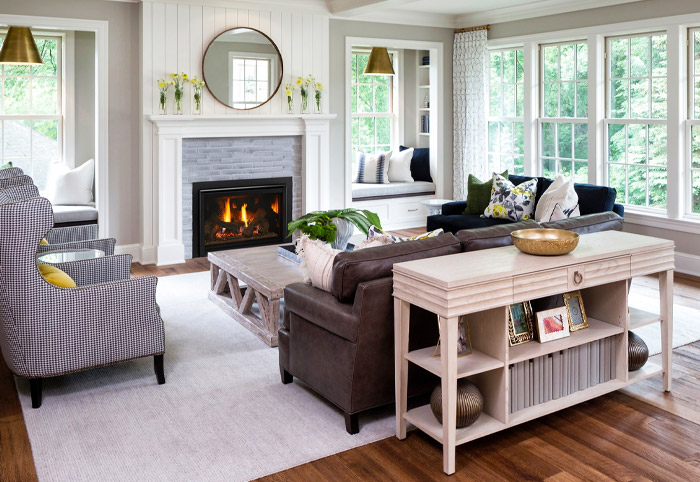 Living room of a modern country home with a built-in fireplace.