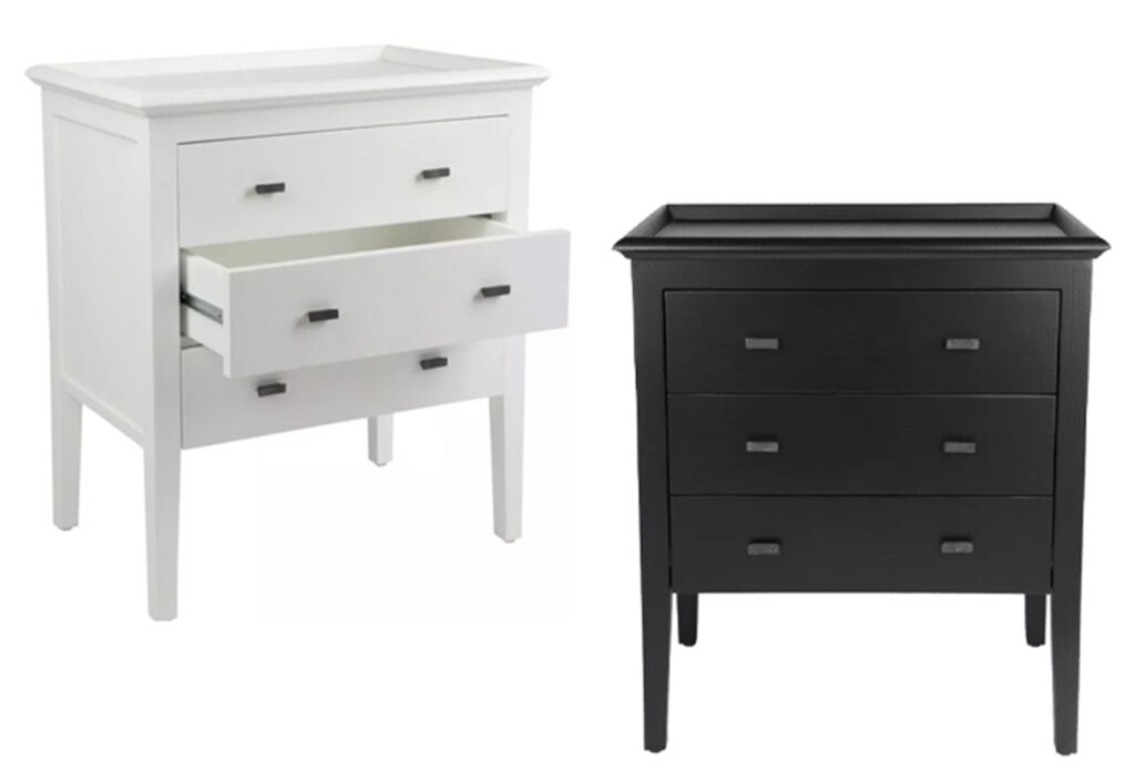White and black Hamptons-style bedside tables.