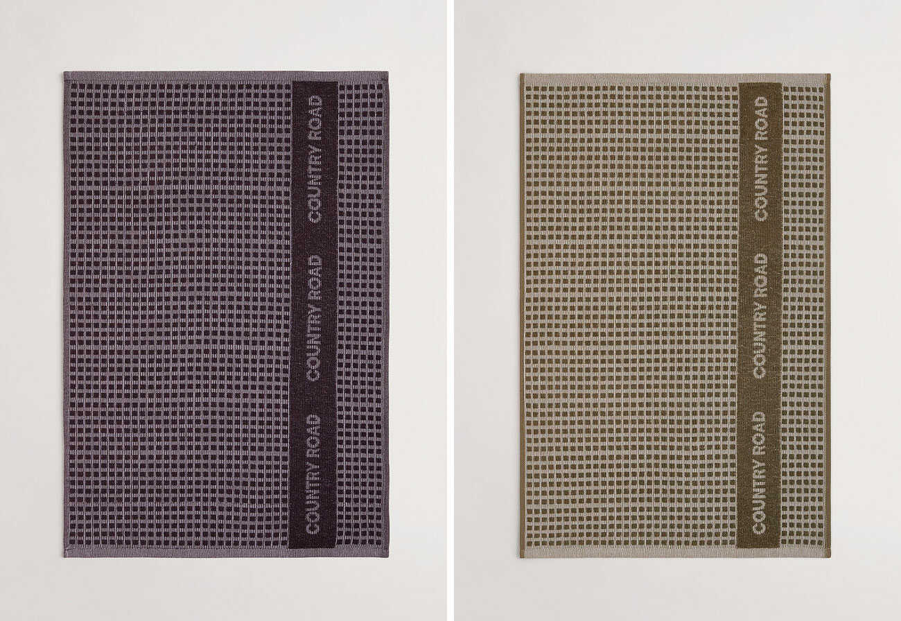 Black and Olive Country Road Elli Tea Towels shown side by side.