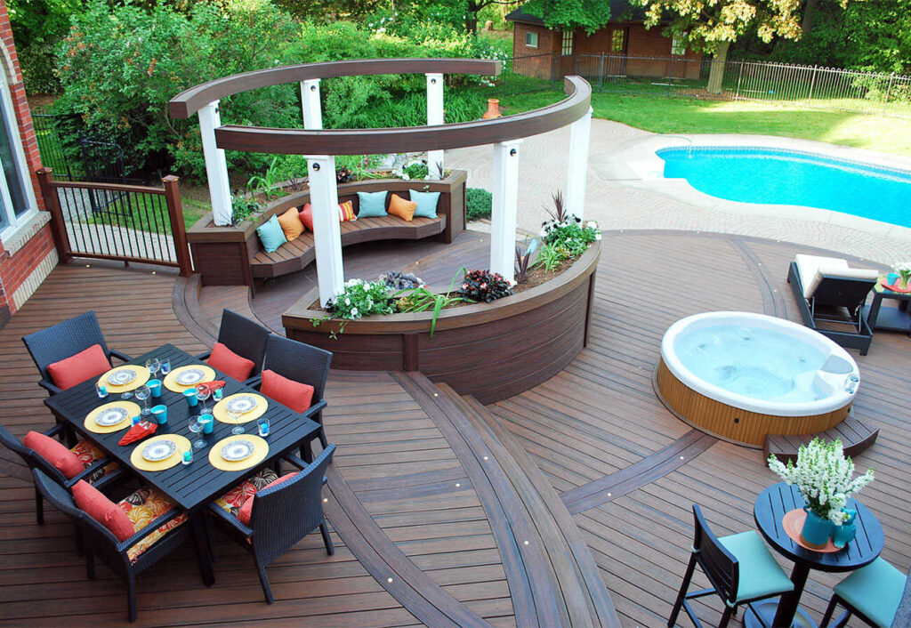 Poolside patio deck with built-in seating and garden bed.