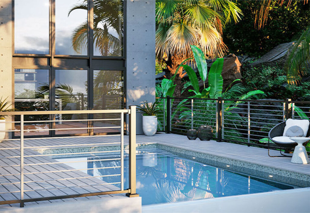 Small swimming pool surrounded by a fenced composite deck.