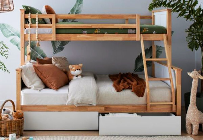 Myer triple bunk bed shown in a kids' room with soft toys.