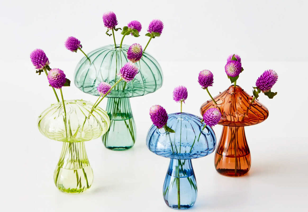 Gigi & Tom mushroom vases in four different colours.