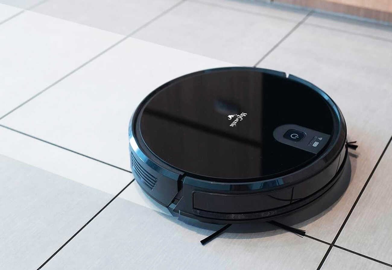 The MyGenie XSonic Wi-fi Pro Robotic Vacuum Cleaner on a hard floor.