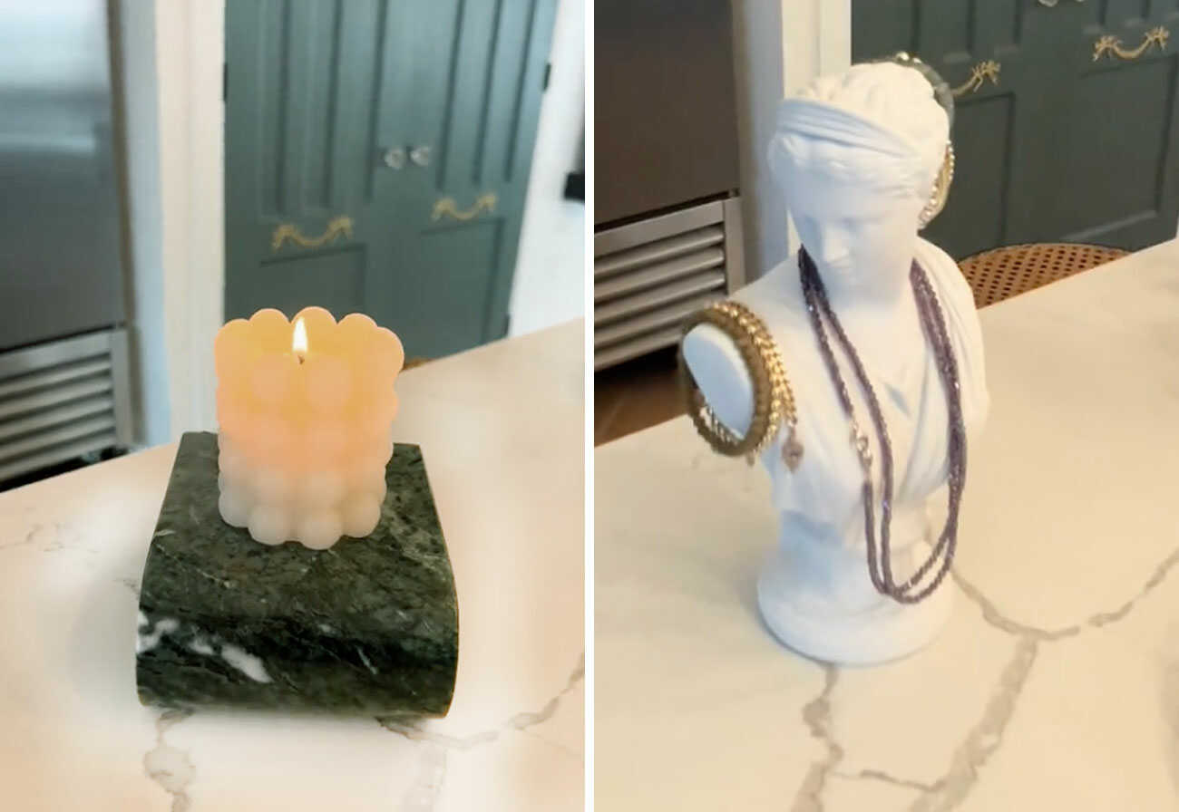 Bookends being used as a candle and jewellery holder.
