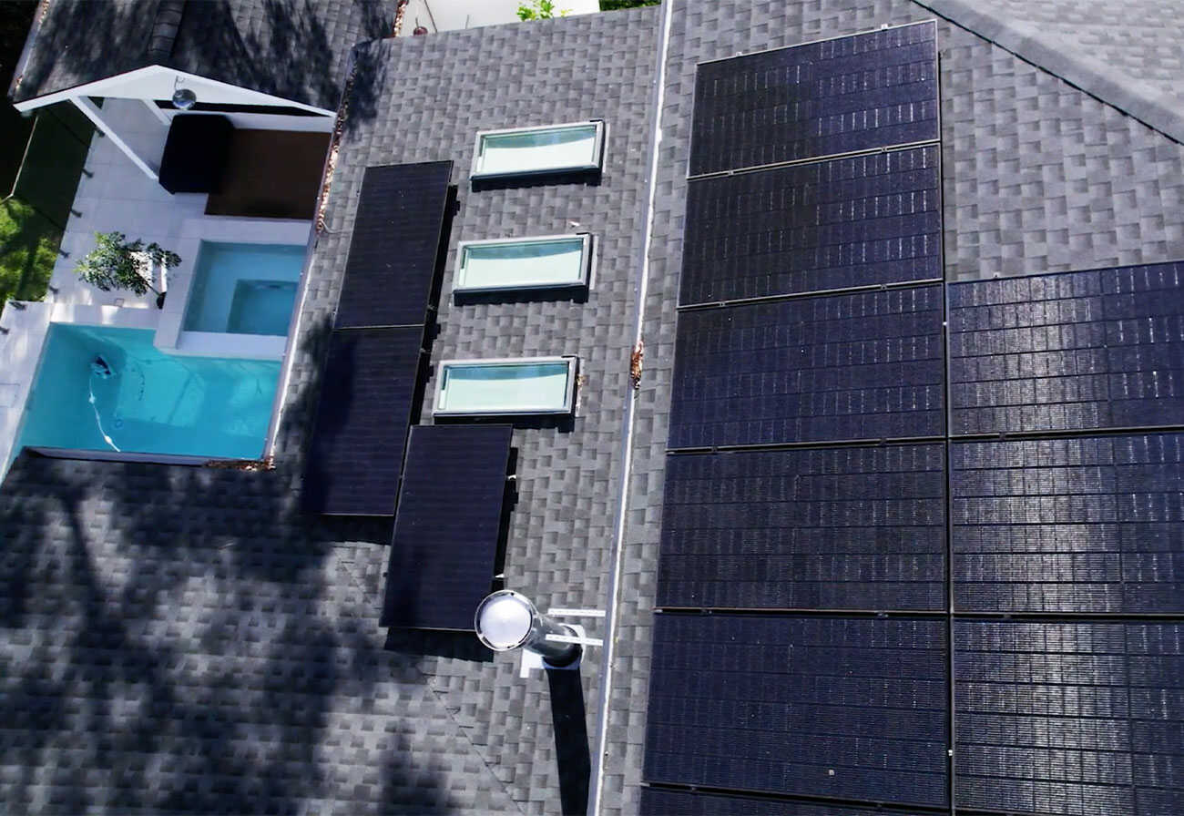 Solar panels on the roof of a family home.