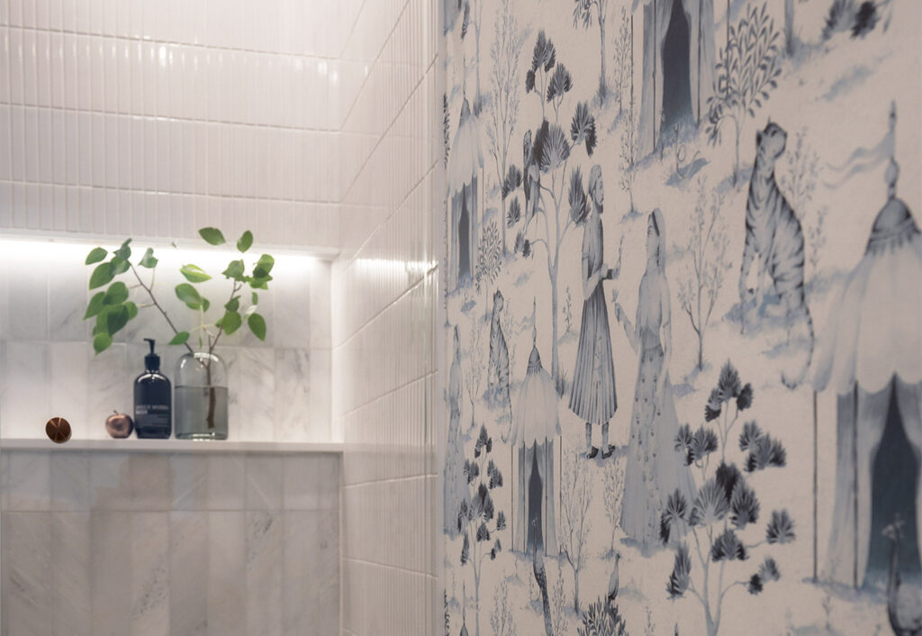 Feature blue patterned wallpaper in Making HOME guest bathroom.