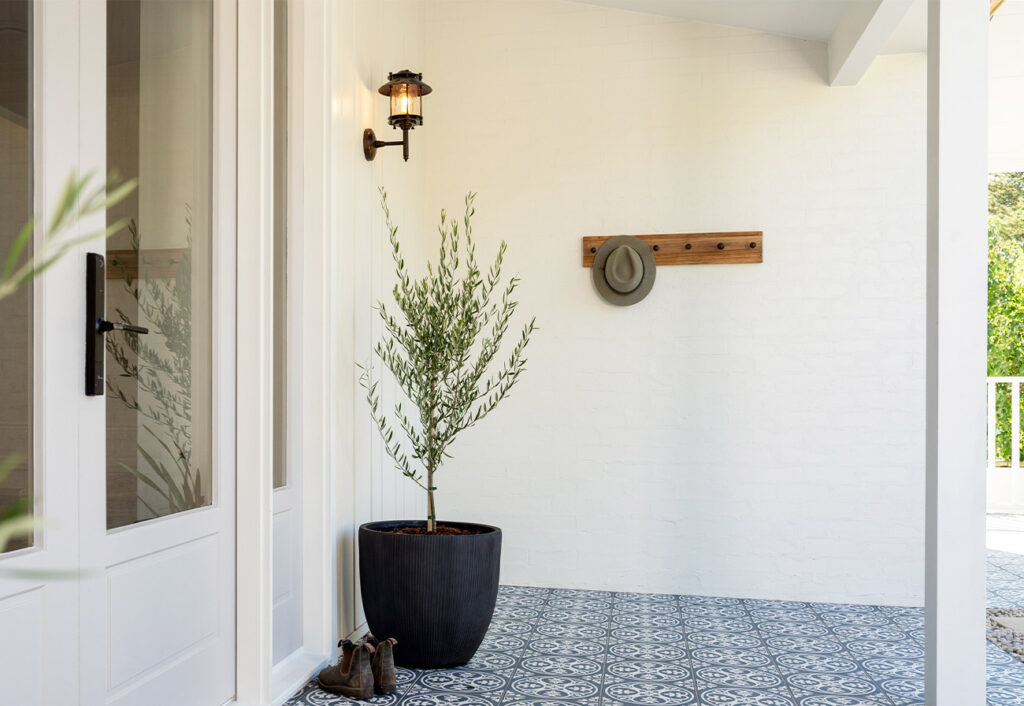 Making HOME front porch with pot plant and wall light.