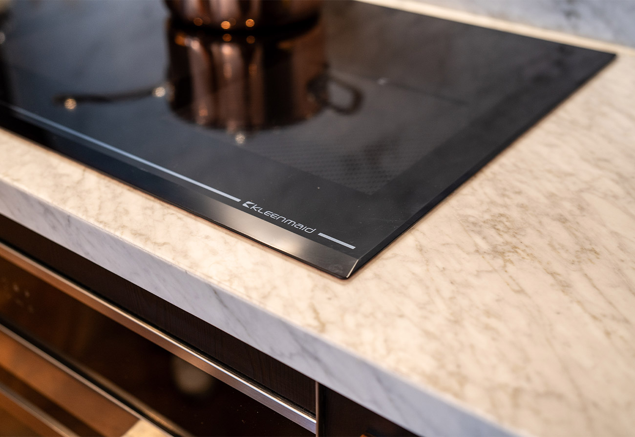 90cm induction cooktop on a marble benchtop.
