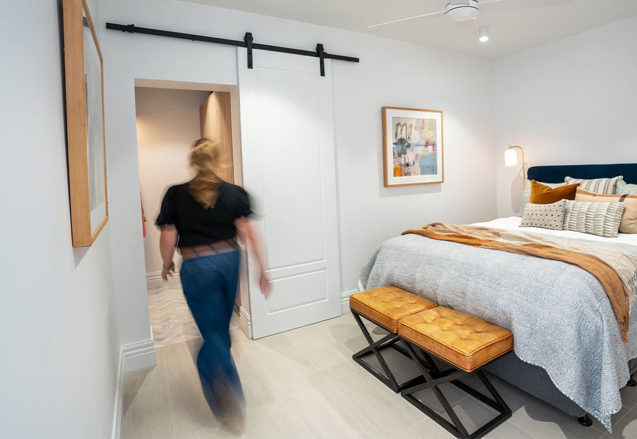 Bedroom with sliding barn door.