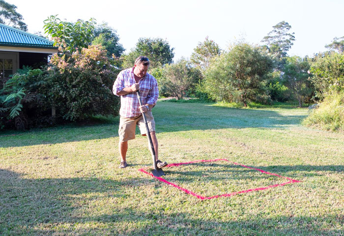 Jason Hodges building a backyard fire pit