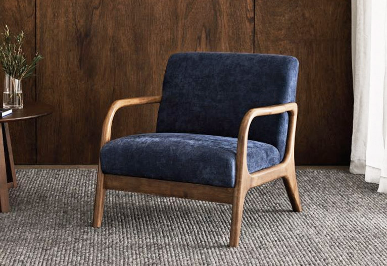 Navy blue mid-century modern armchair.