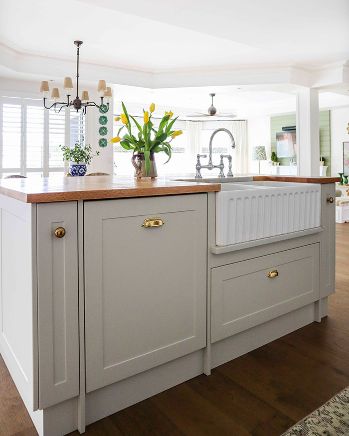 Kaboodle farmhouse kitchen featuring shaker-style doors