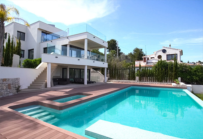 house with landscaped pool area