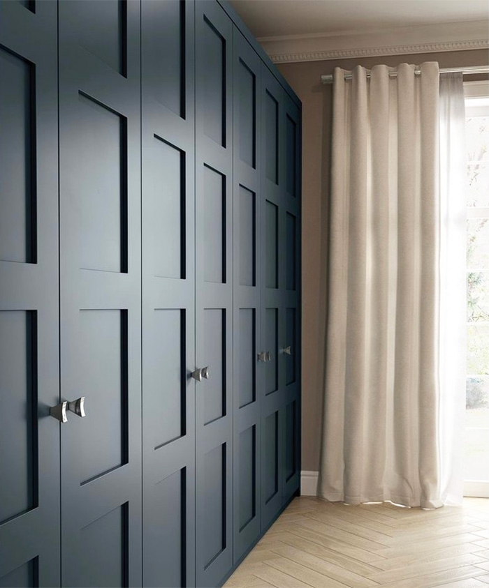 Deep blue panelled wardrobes