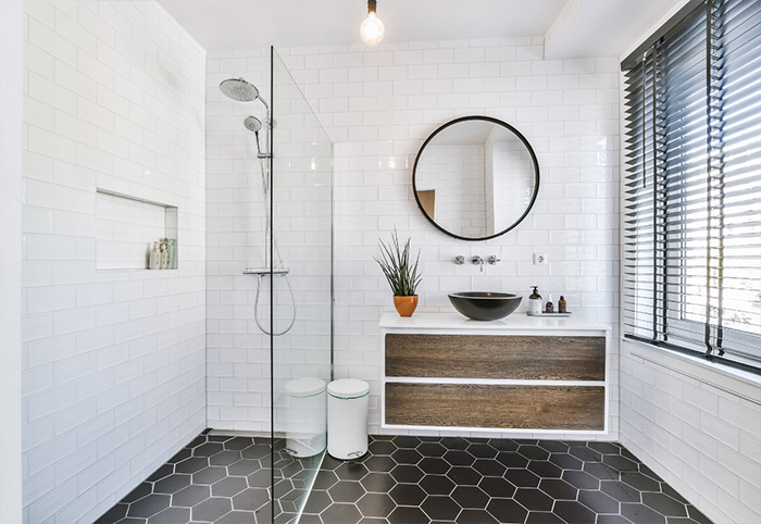 A new bathroom with shower and vanity