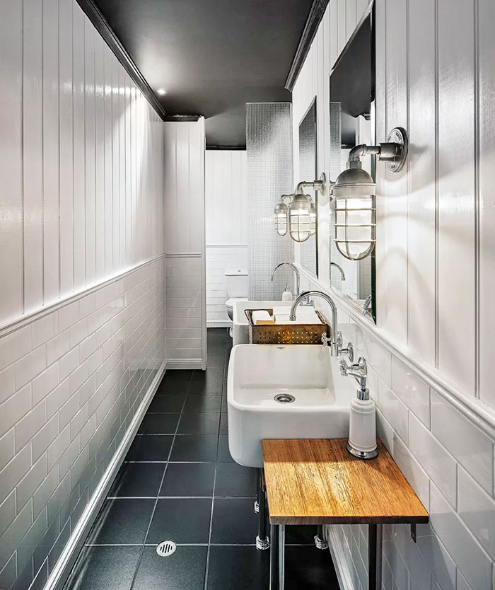 Barn lights in a domestic bathroom 