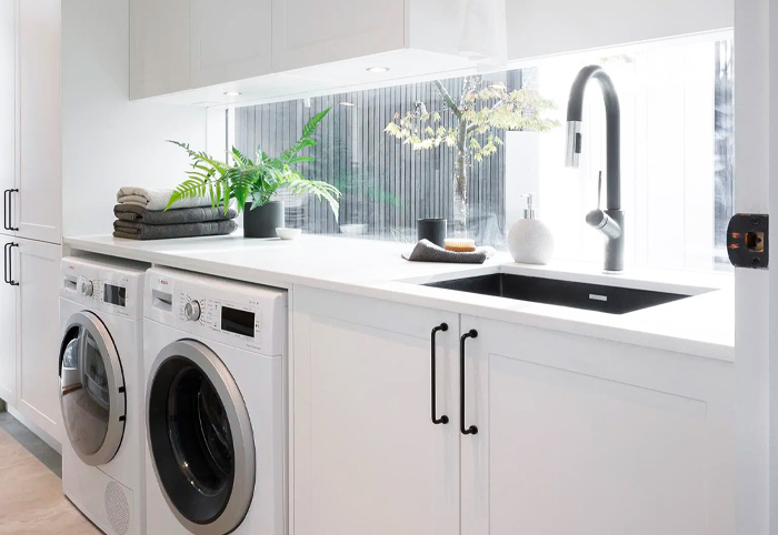 Kinsman Laundry with Caesarstone Intense White bench colour