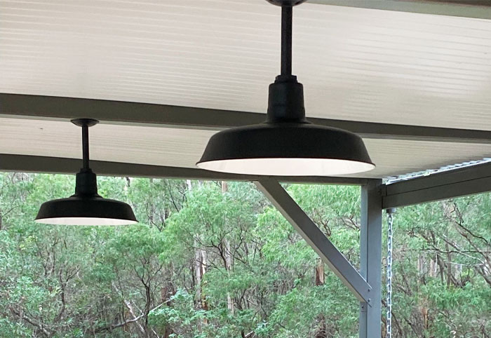 Original Solid Stem-Mounted Barn Lights in patio area