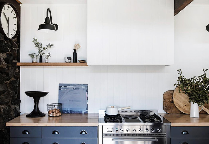 The Eclipse Gooseneck Barn Light in a country kitchen