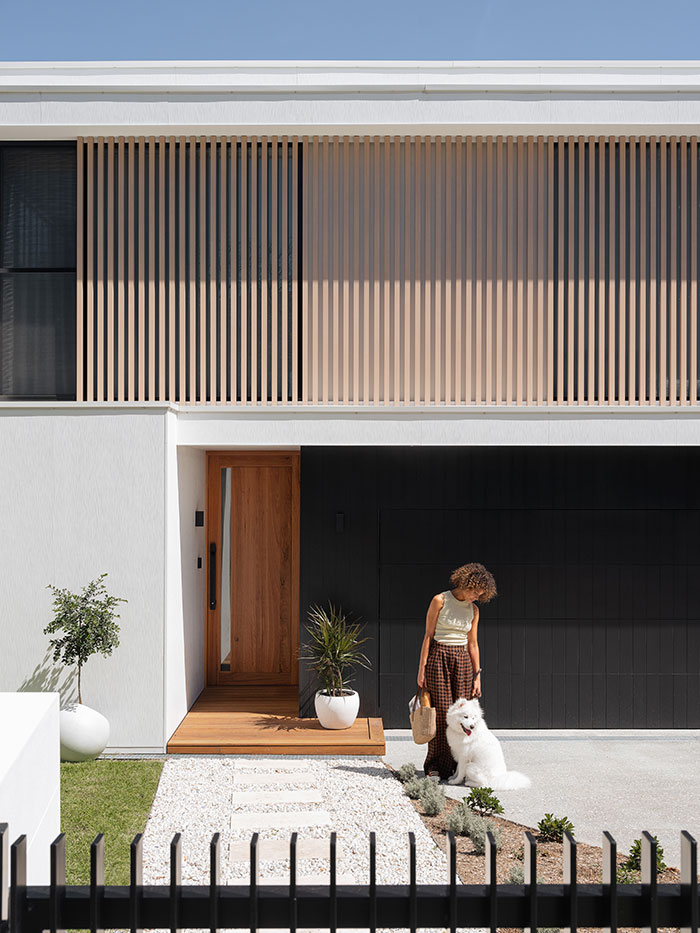 Exterior of Bennett House by Futureflip featuring white concrete facade.