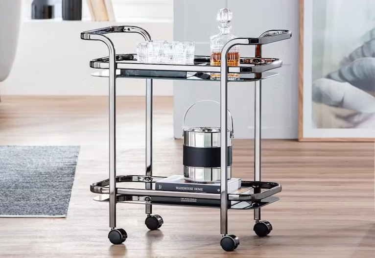 Trist nickel and glass bar cart.