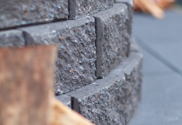 Close-up of Adbri Masonry Miniwall garden bricks in stacked formation.