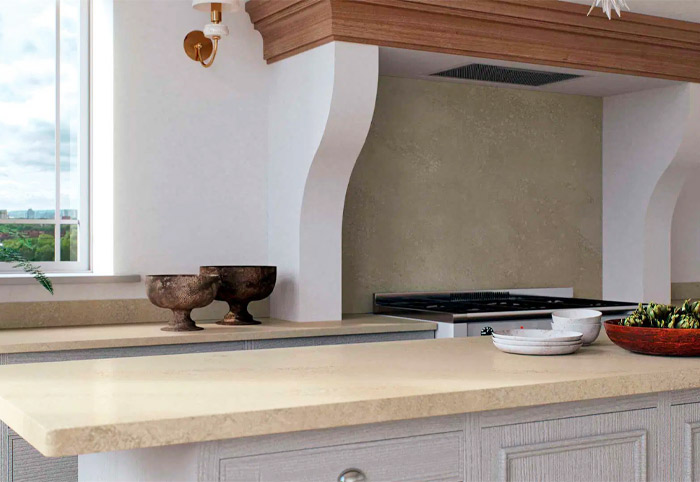 Exotic-looking kitchen with stone bench and whitewash wood.