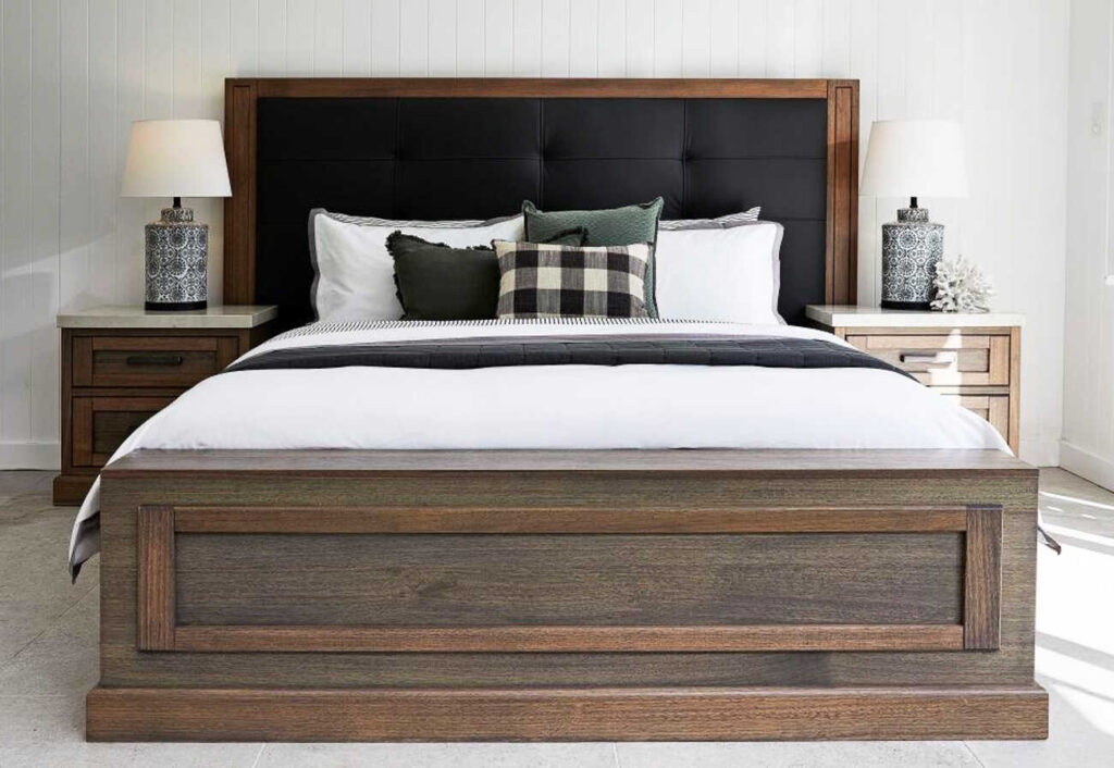 Walnut-coloured bedroom suite with large bed and two bedside tables in a Hamptons design.