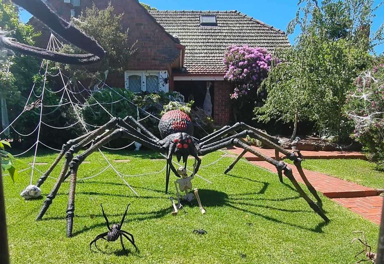 Large fake spider out the front of a house for Halloween.