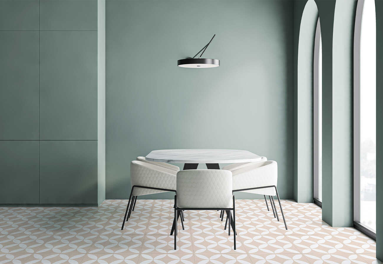 Living room with decorative tiles and a green feature wall. 