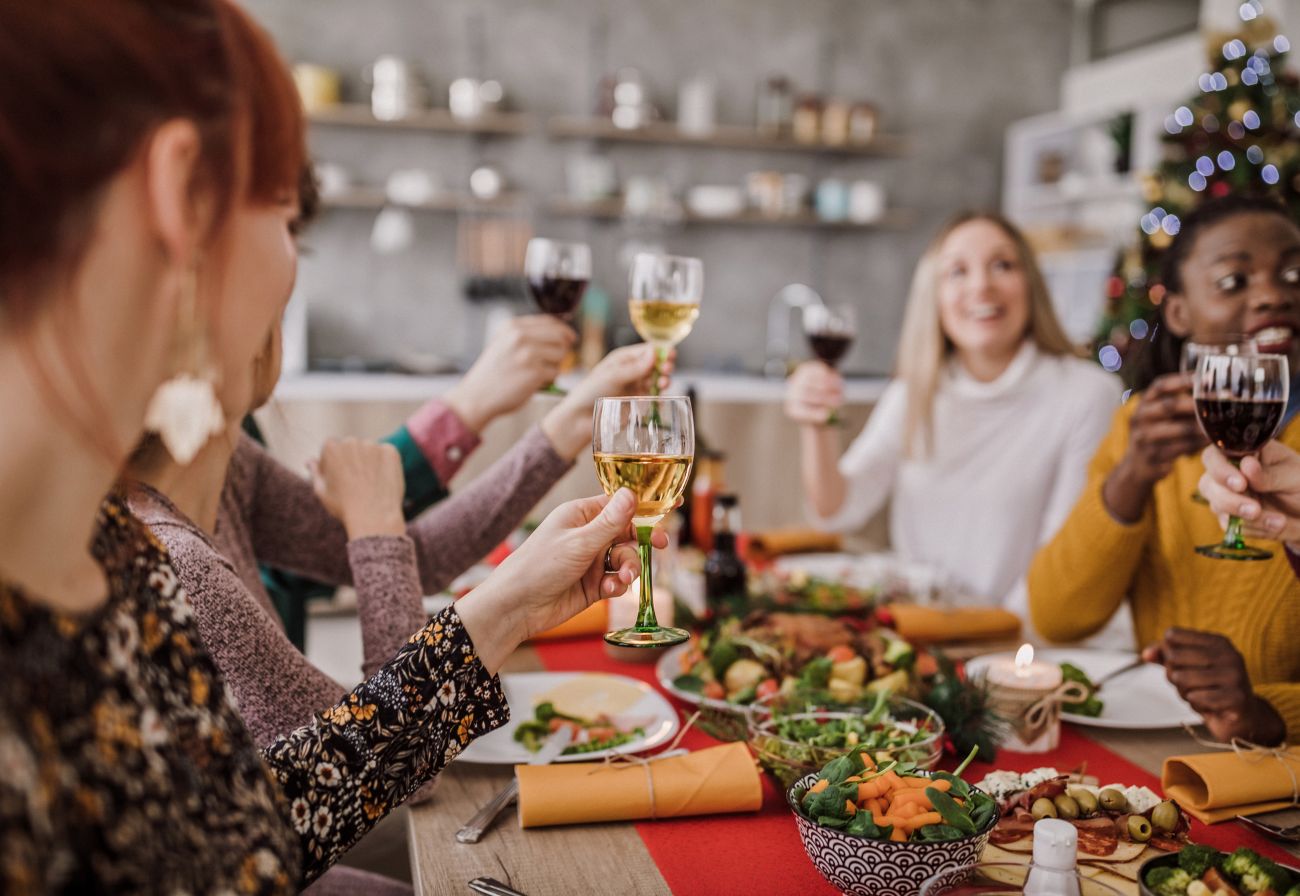 People celebrating Christmas at the dining table.