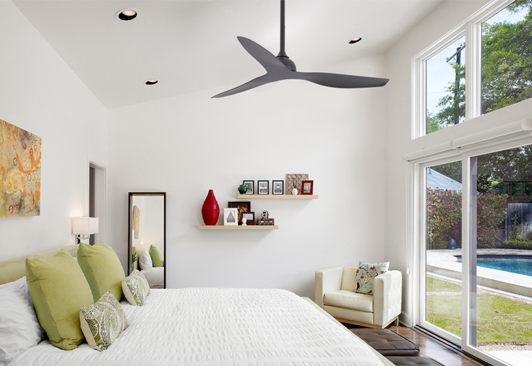 Black ceiling fan in a bedroom.