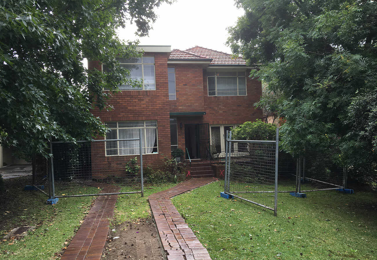 1950s red-brick house before its renovation.