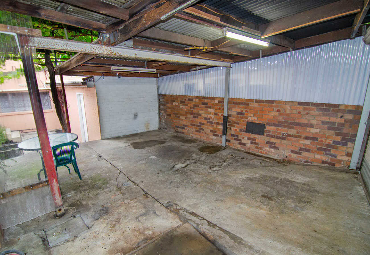 Rear of an unrenovated townhouse in Sydney.