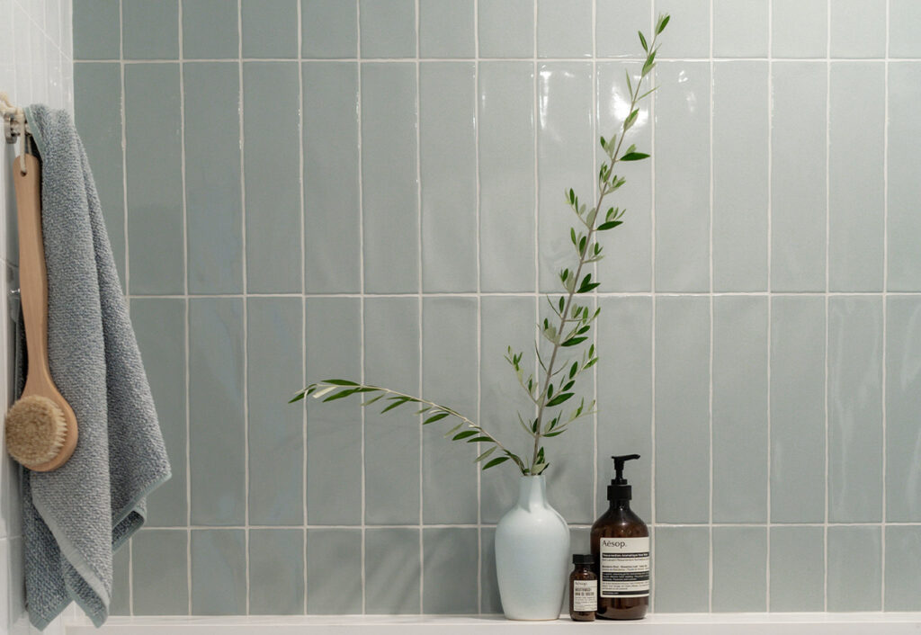 Agrestic Blue tiles on a bathroom wall.