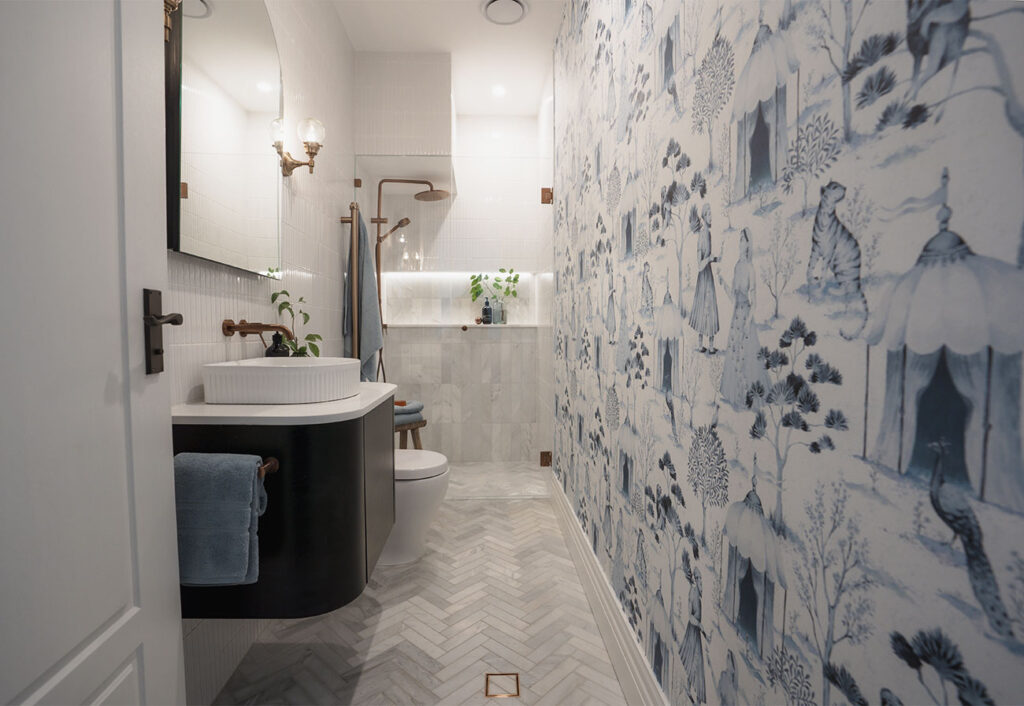 Guest bathroom with blue patterned wallpaper.