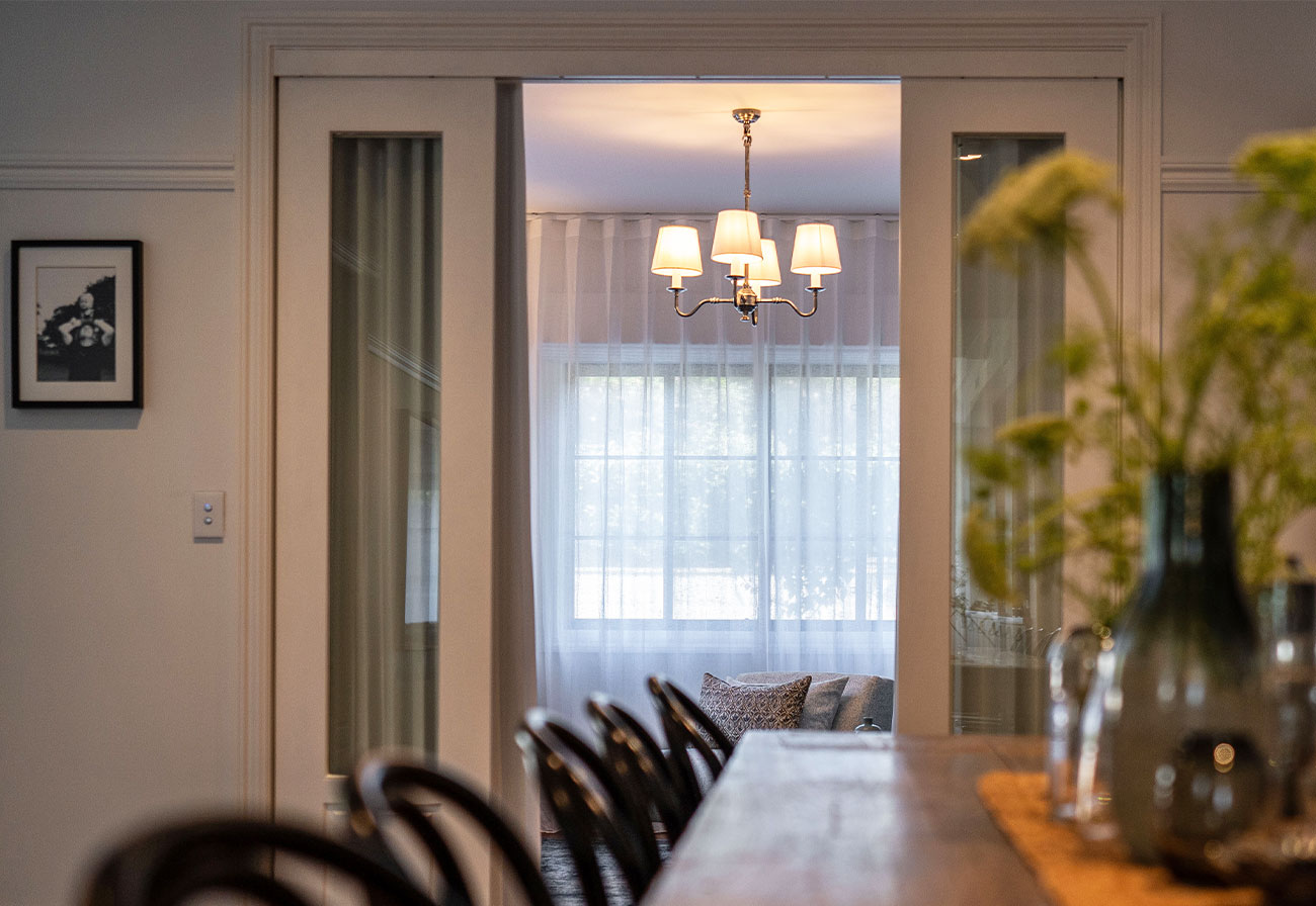 Double doors leading from dining room to media room.