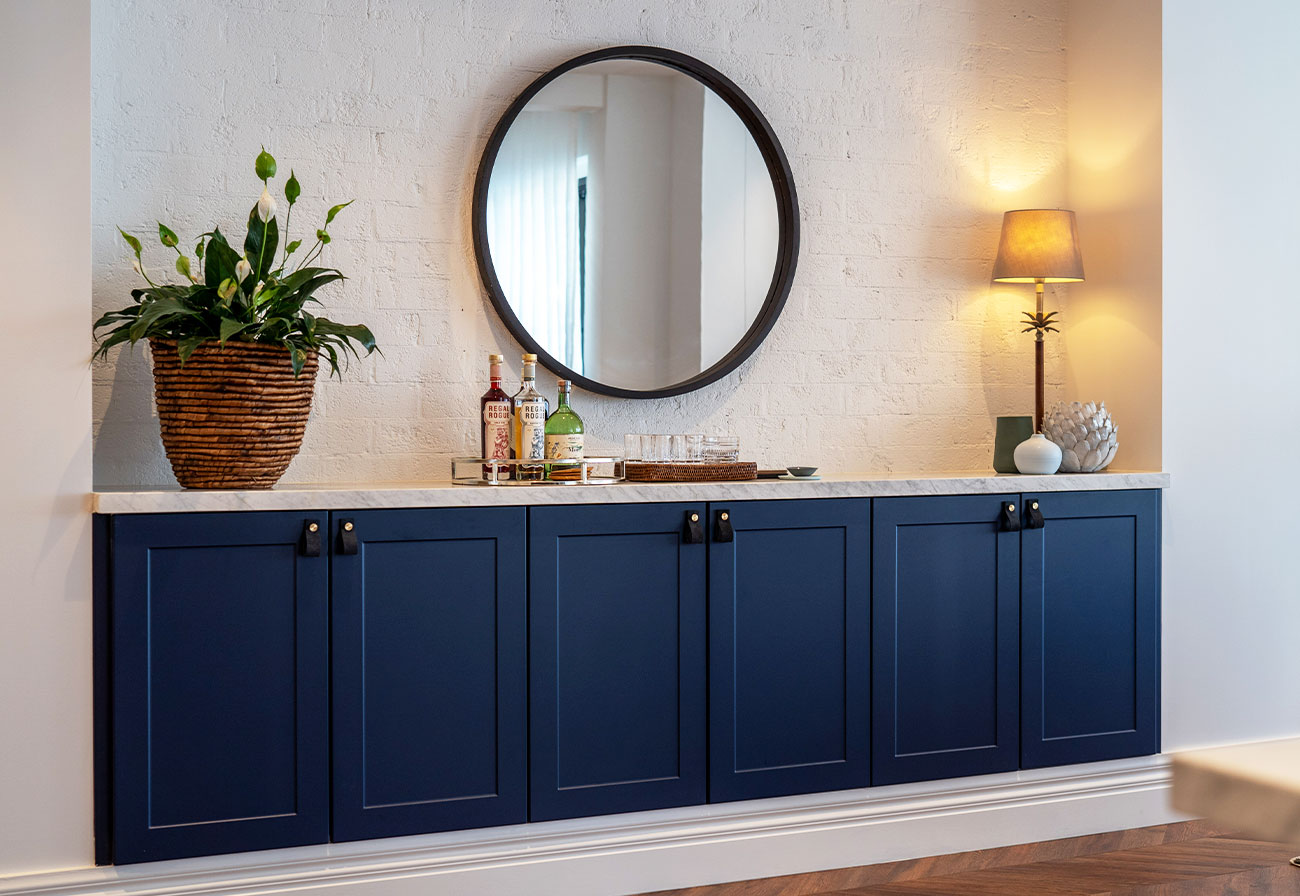 Navy dining room sideboard.