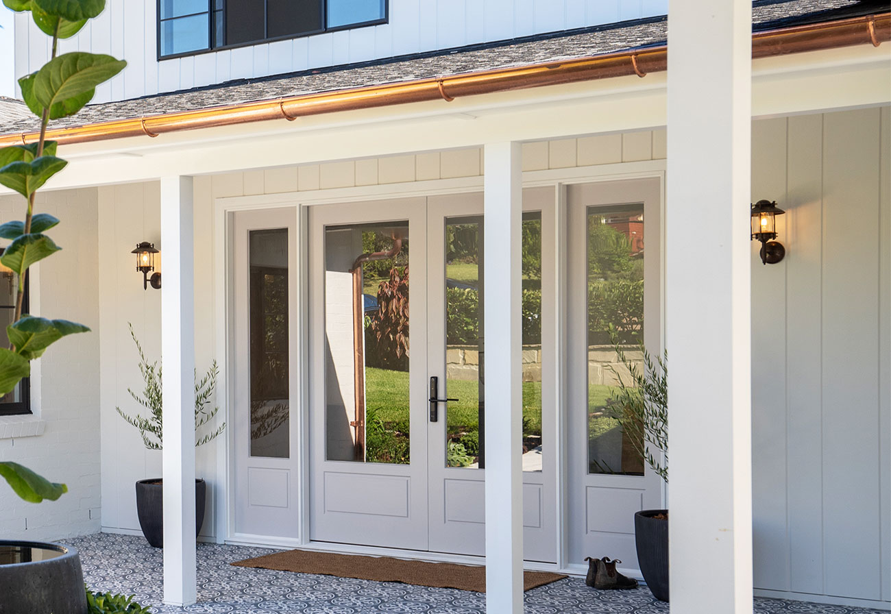 Modern Farmhouse double glass entry doors.