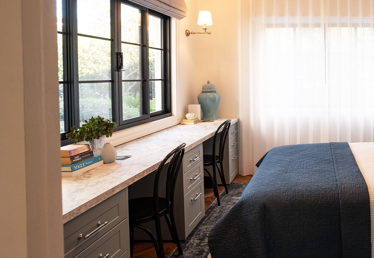 Study desk with marble-look benchtops.