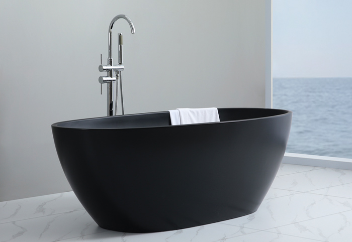 Matte black freestanding bathtub.