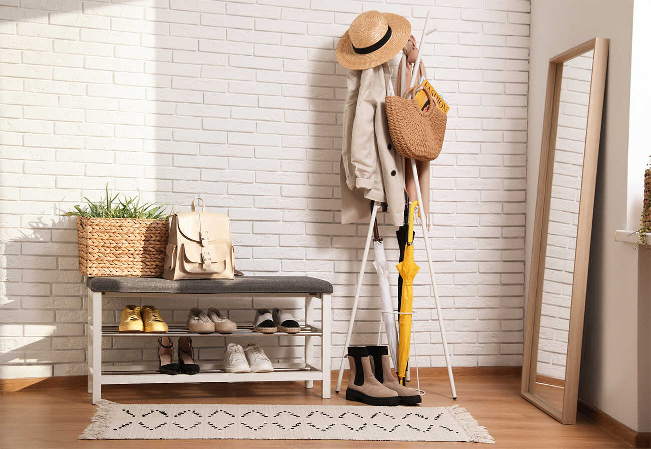 Shoe rack at a home's entrance.