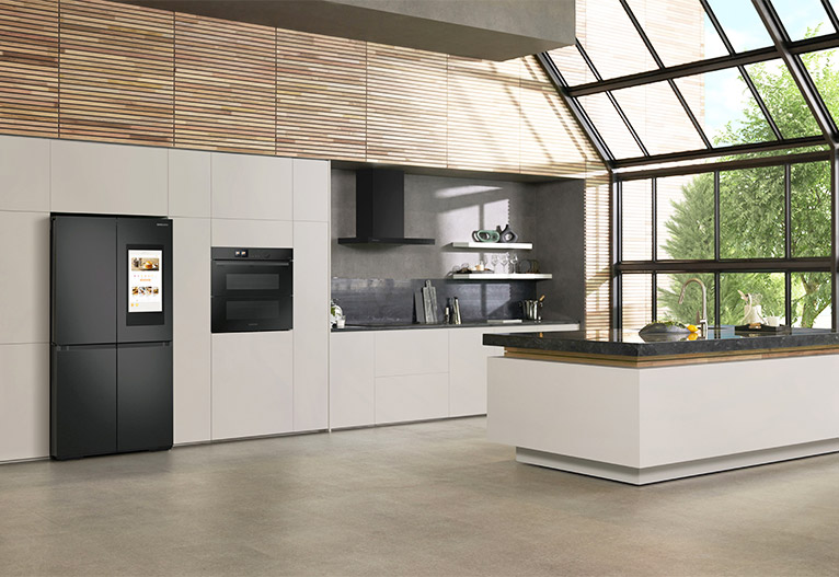 Modern kitchen with wood detail on ceiling and concrete floor.